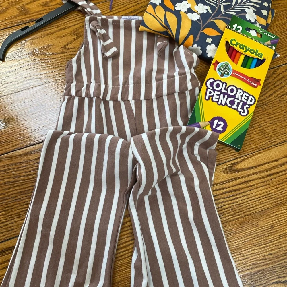 Girls striped toddler’s overalls with floral top.  Size XS (2T). No brand.